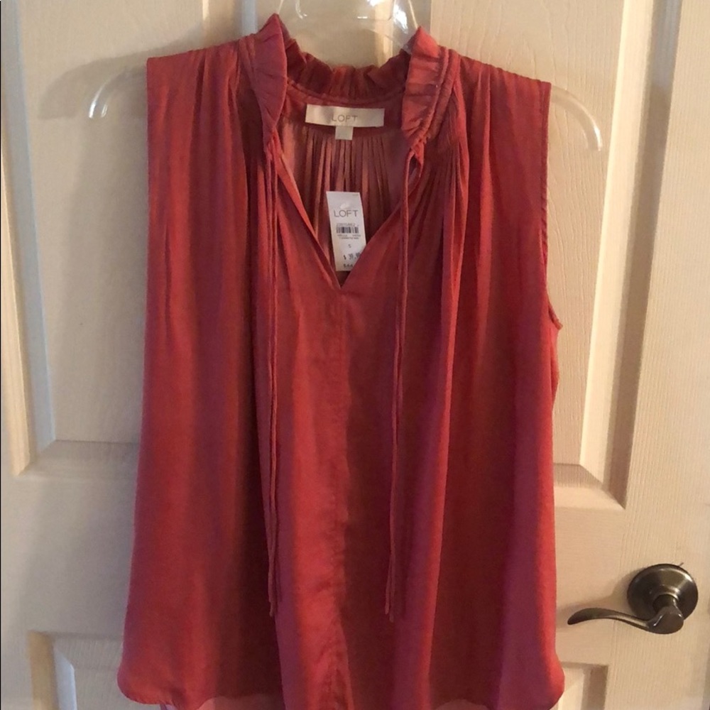 Sleeveless Valentines Day blouse.